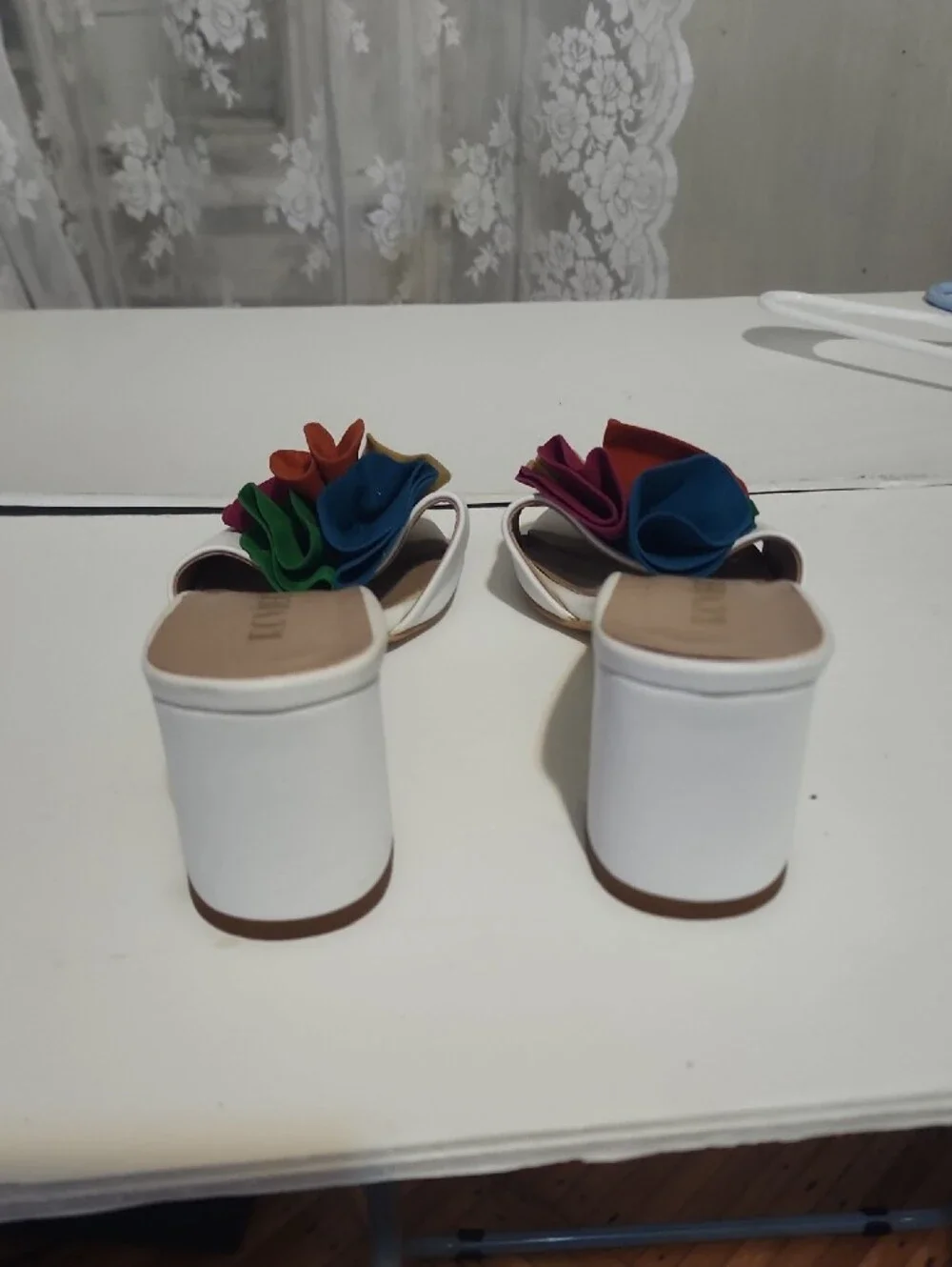 White Heeled Slide Sandals with Multicolor Floral Accent